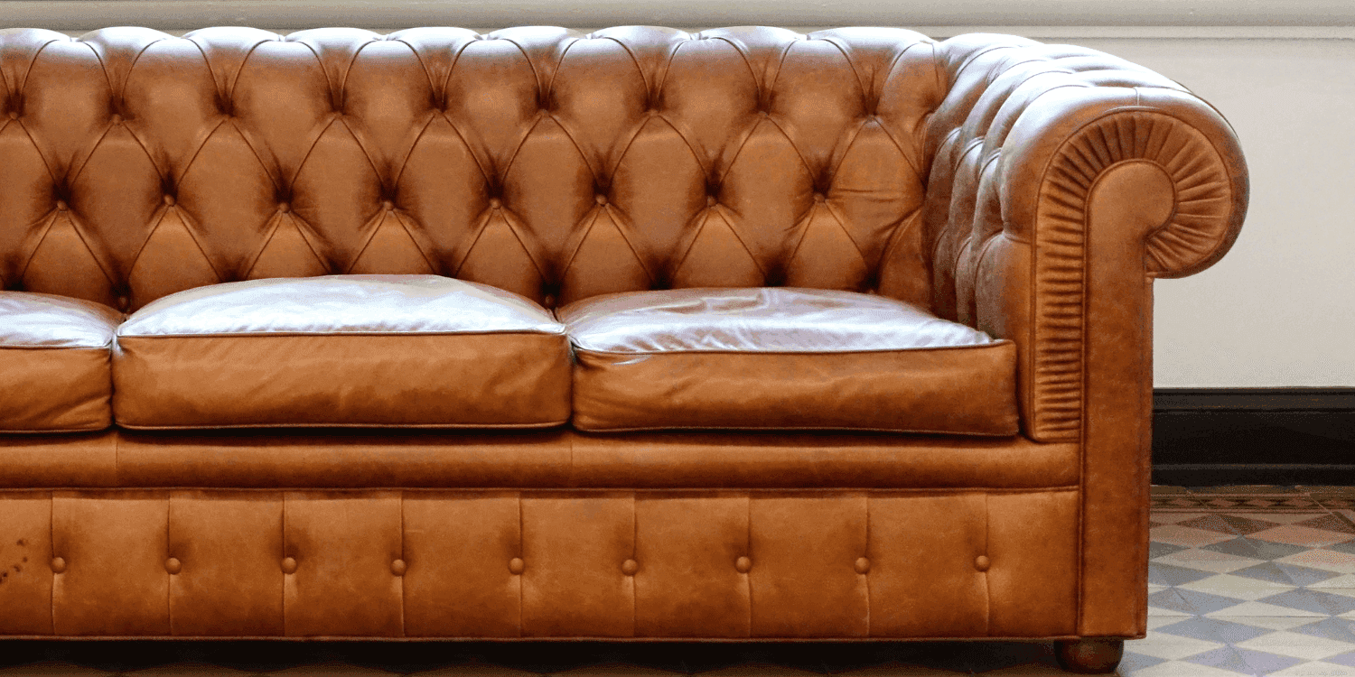 A brown, vintage-looking leather couch.